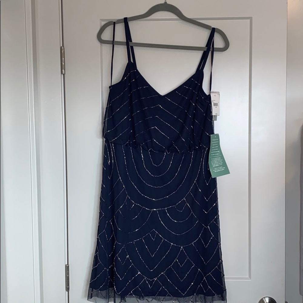 Beaded navy blue dress, brand new with tags.